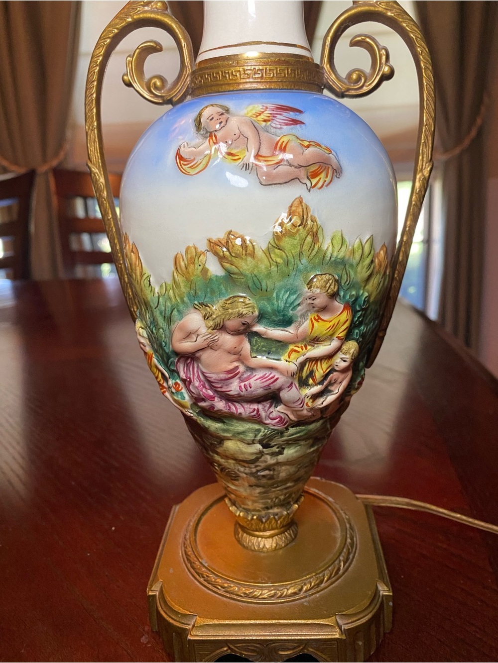 Capodimonte Vintage Figural Porcelain Twin Handle Cherub Lamp with gold trim.